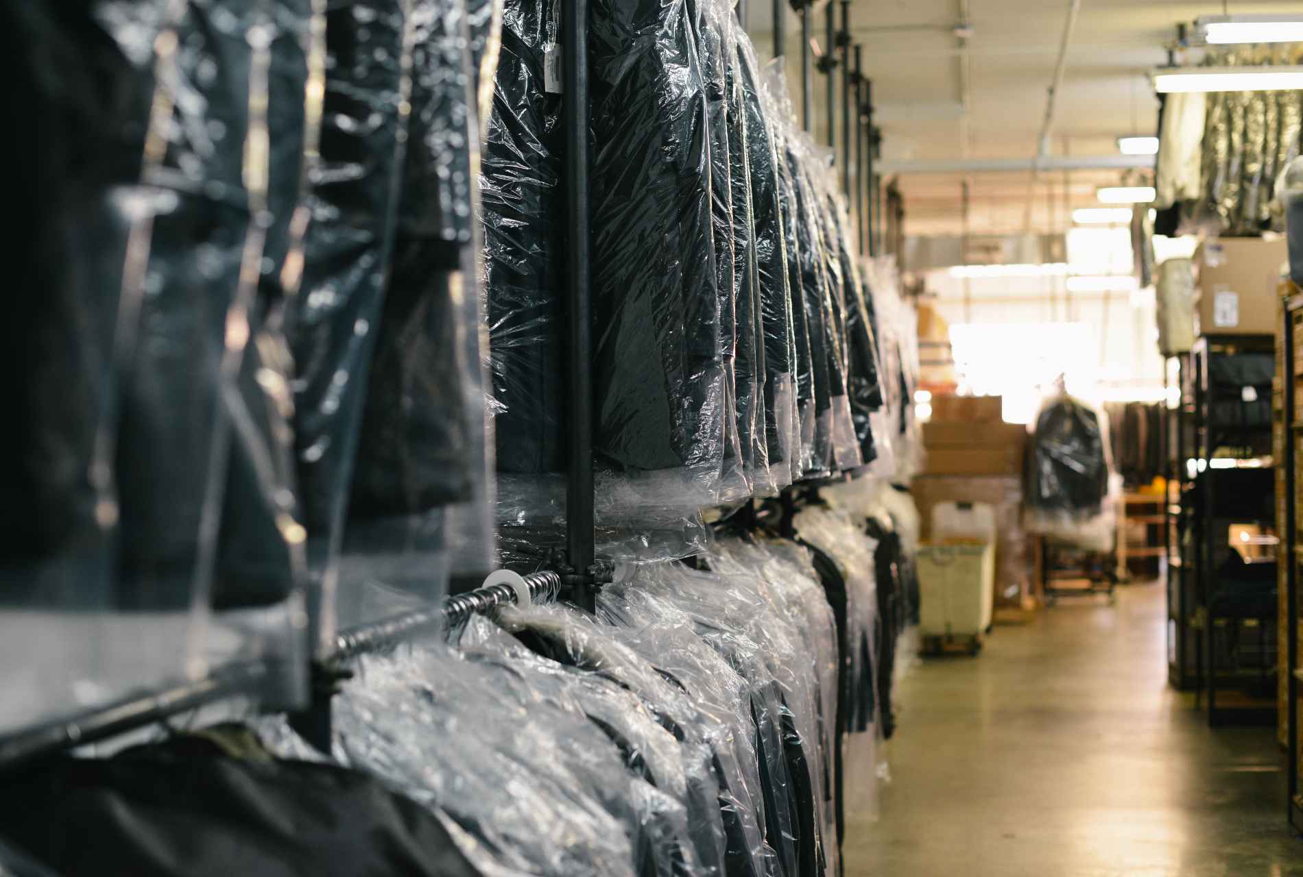 dry cleaning hanging in store